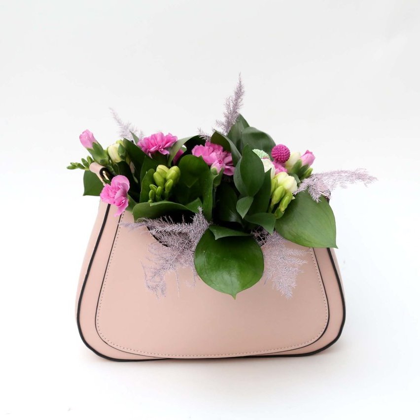 Blómaskreytingar í veski