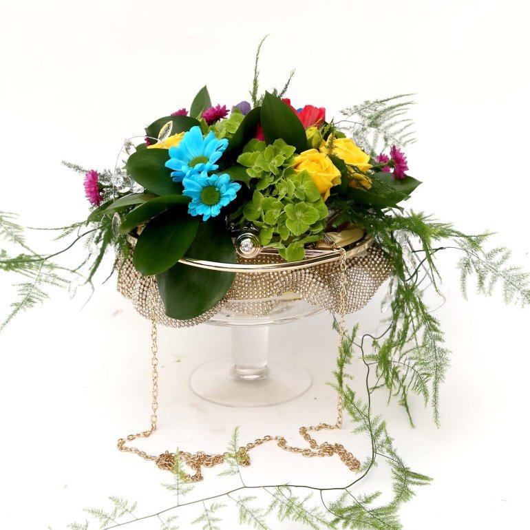 Blómaskreytingar í veski