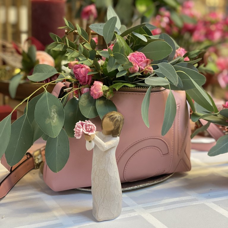 Blómaskreytingar í veski