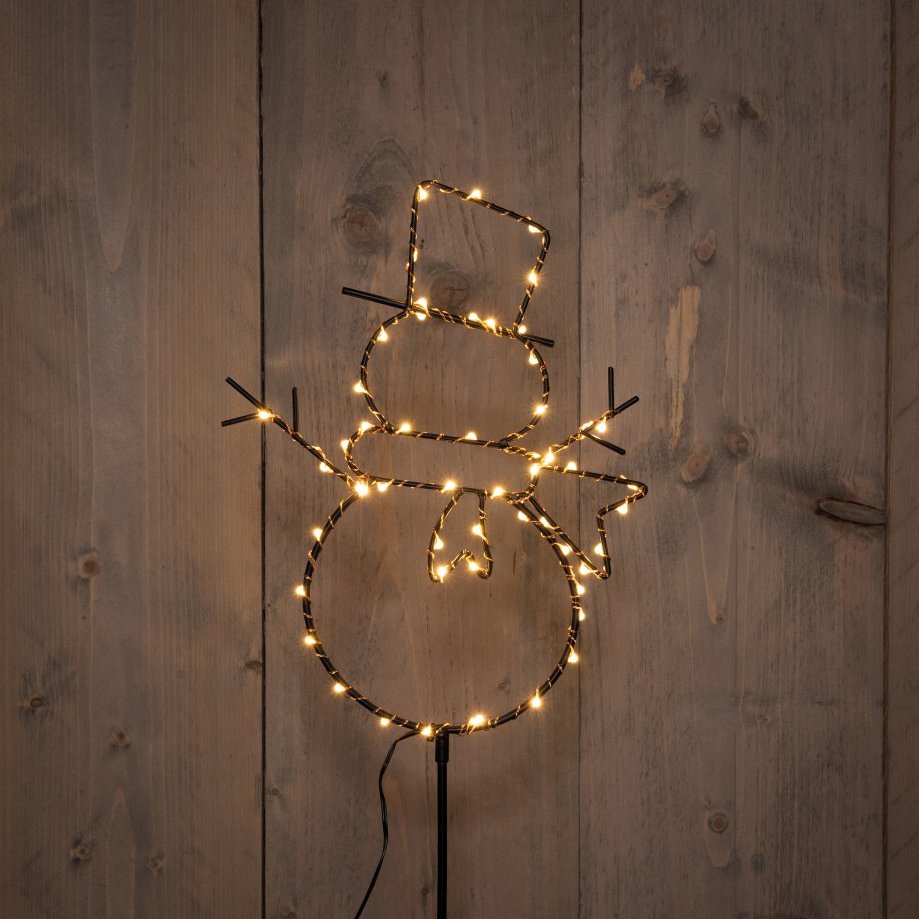 Snjókarl svartur, hvítt ljós - úti