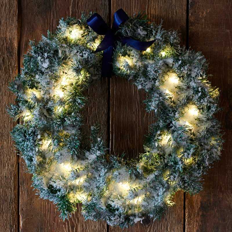 Anton hurðakrans með snjó