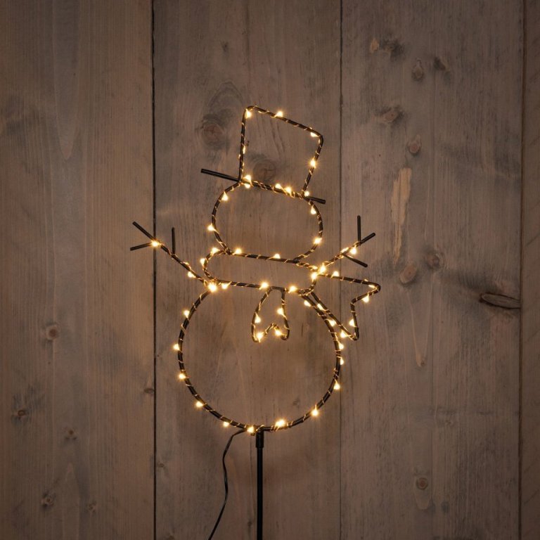 Snjókarl svartur, hvítt ljós - úti